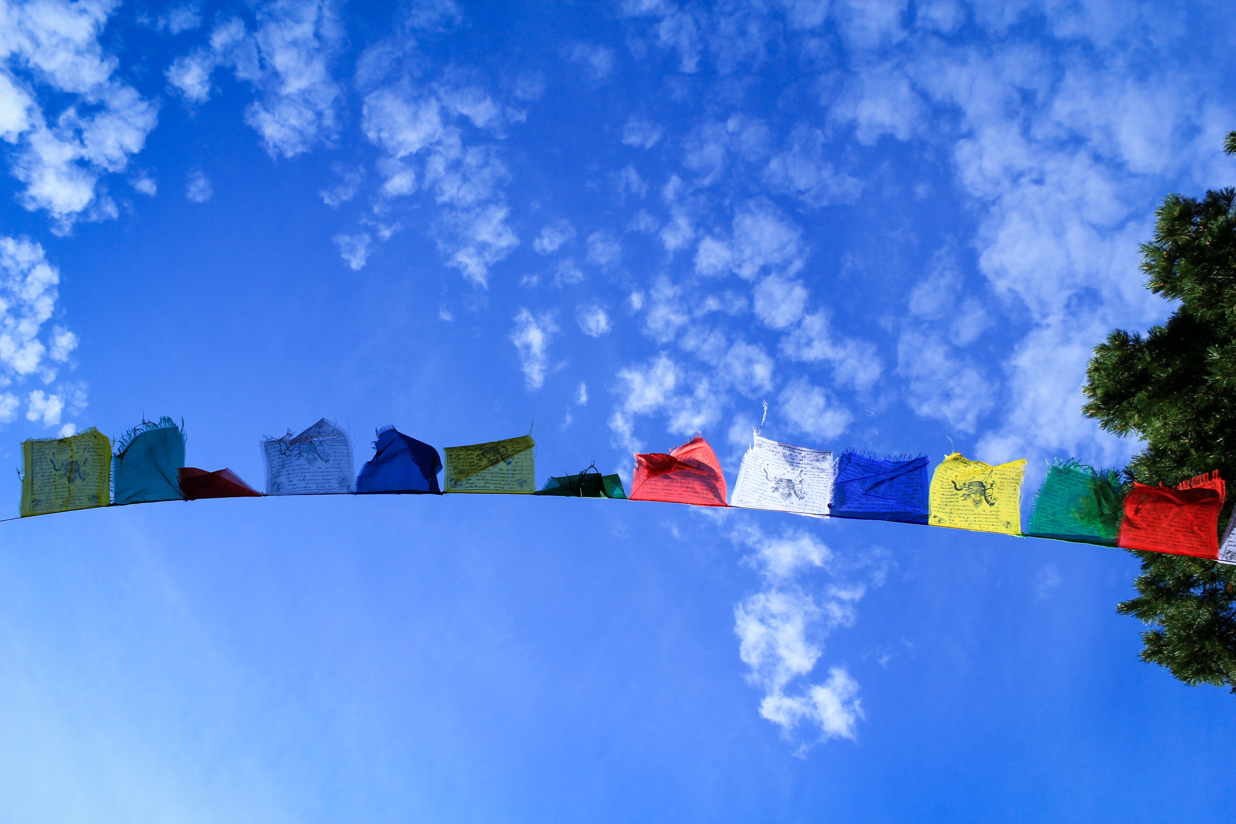 Prayer flags against blue sky
